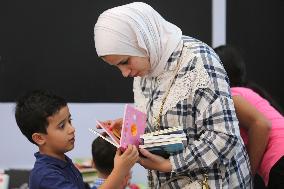 MIDEAST-SURDA-BOOK FAIR