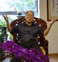 Ex-China Communist Party leader Hu Yaobang's son