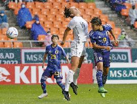 Football: Japan vs. New Zealand