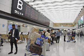Japan eases COVID-19 border controls