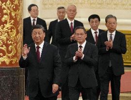 China's Xi launches new leadership