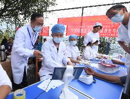 CHINA-GUANGXI-RONGSHUI-FREE MEDICAL SERVICES (CN)