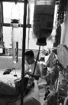 Death of a Second-Generation Atomic Bomb Victim