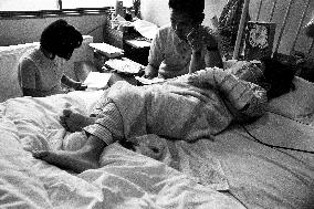 Death of a Second-Generation Atomic Bomb Victim