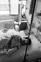 Death of a Second-Generation Atomic Bomb Victim