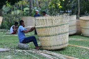 INDIA-ASSAM-NAGAON-DAILY LIFE-BAMBOO BASKETS