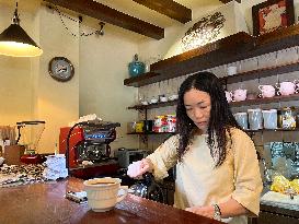 CHINA-HAINAN-WANNING-CAFE-RETURNED OVERSEAS CHINESE (CN)