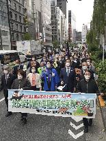 Ex-islanders call for early return of islands off Hokkaido during rally in Tokyo