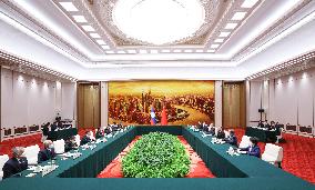 CHINA-BEIJING-WANG YANG-LAO PRESIDENT-MEETING (CN)