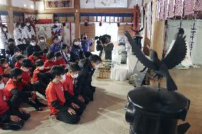 Children pray for Japan's World Cup victory