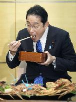 Japan PM Kishida treated to crabs
