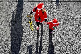 NORTH MACEDONIA-SKOPJE-CHRISTMAS-SANTA RACE