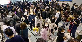 Travelers at Fukuoka airport