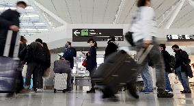Travelers at Fukuoka airport