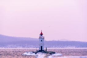 RUSSIA-VLADIVOSTOK-SUNRISE OVER LIGHTHOUSE