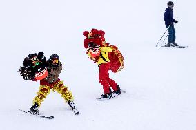 SLOVENIA-KRVAVEC-LION DANCE ON SNOWBOARD