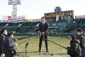 Athletics pitcher Fujinami meets press at Koshien Stadium