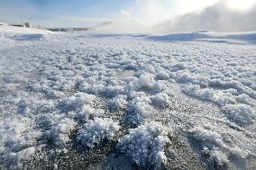Frost flowers on icy river in Hokkaido