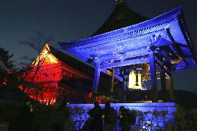 Zenko-ji temple bell tower lit up in Ukrainian colors