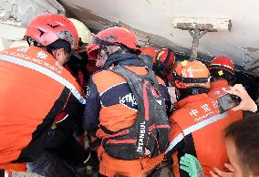 TÜRKIYE-HATAY-EARTHQUAKES-CHINESE RESCUE TEAM-WOMAN SURVIVOR-RESCUE