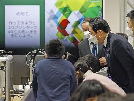 Japan PM Kishida visits elementary school