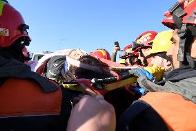 TÜRKIYE-HATAY-EARTHQUAKES-CHINESE RESCUE TEAM-WOMAN SURVIVOR-RESCUE