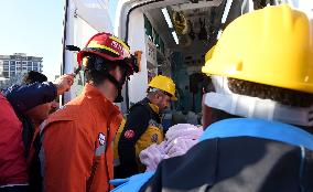 TÜRKIYE-HATAY-EARTHQUAKES-CHINESE RESCUE TEAM-WOMAN SURVIVOR-RESCUE