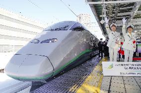 Silver-colored shinkansen train