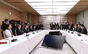 Japan's government holds meeting on wage hike