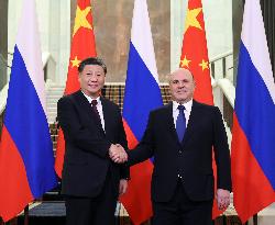RUSSIA-MOSCOW-CHINA-XI JINPING-RUSSIAN PM-MEETING