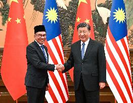 CHINA-BEIJING-XI JINPING-MALAYSIAN PM-MEETING (CN)