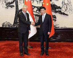 CHINA-BEIJING-WANG HUNING-SINGAPOREAN PM-MEETING (CN)