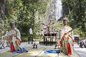 Ritual at waterfall in western Japan