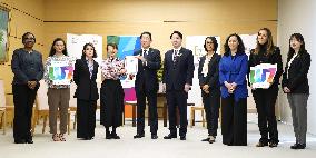 Japan PM meets women's rights activists