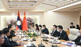 CHINA-BEIJING-QIN GANG-LAOS-SALEUMXAY KOMMASITH-MEETING (CN)