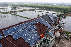Xinhua Headlines: China wages rooftop "green war" against climate change