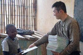 KENYA-NAIROBI-MATHARE SLUM-SCHOOL-BOOK READING