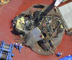 Part of wreckage of sunken Japan GSDF chopper recovered