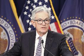 Fed hikes key rate by 0.25 point