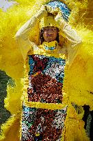 New Orleans Jazz & Heritage Festival Mardi Gras Indian Parade Participants March In Fair Grounds Race Course