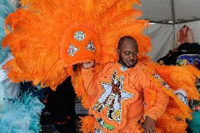 New Orleans Jazz & Heritage Festival Mardi Gras Indian Parade Participants March In Fair Grounds Race Course