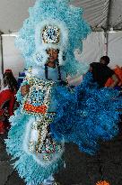 New Orleans Jazz & Heritage Festival Mardi Gras Indian Parade Participants March In Fair Grounds Race Course