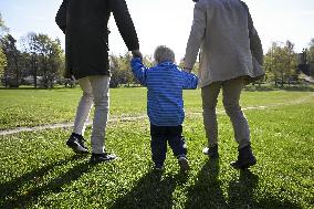 Male couple with their child