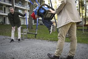 Male couple with their child