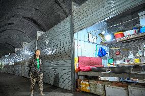 A Food Market in An Abandoned Railway Tunnel in Chongqing