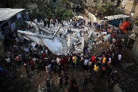 Gaza City Home Hit in Israeli Air Strike Amidst Struggle for Ceasefire