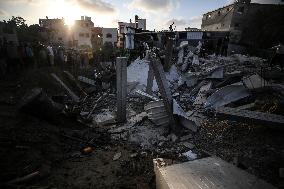 Gaza City Home Hit in Israeli Air Strike Amidst Struggle for Ceasefire