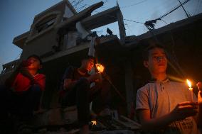 MIDEAST-GAZA-RAFAH-CANDLES ON RUINS