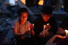 MIDEAST-GAZA-RAFAH-CANDLES ON RUINS