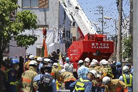 Crane topples at Tokyo construction site